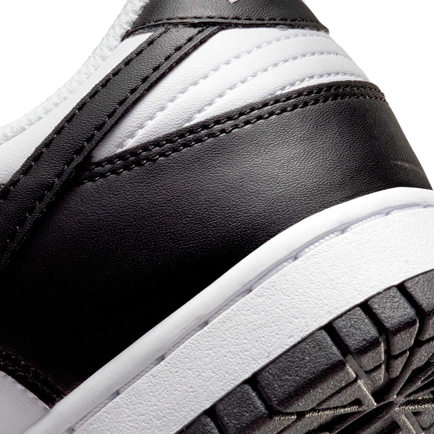 nike dunk low next nature white black